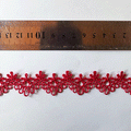 Macrame flor corona rojo (X METRO)