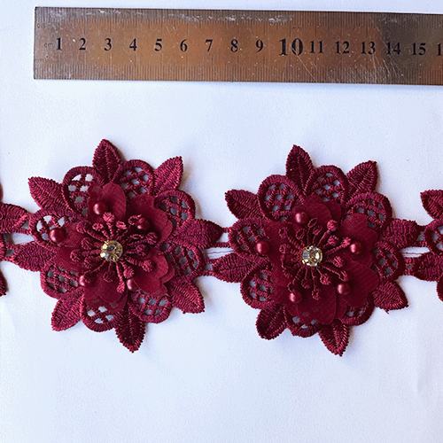 Macrame flor estrella burdeo (X METRO)